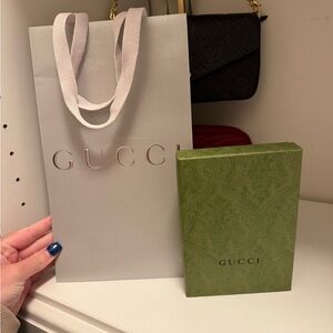 Gucci box, dust bag, and shopping bag.